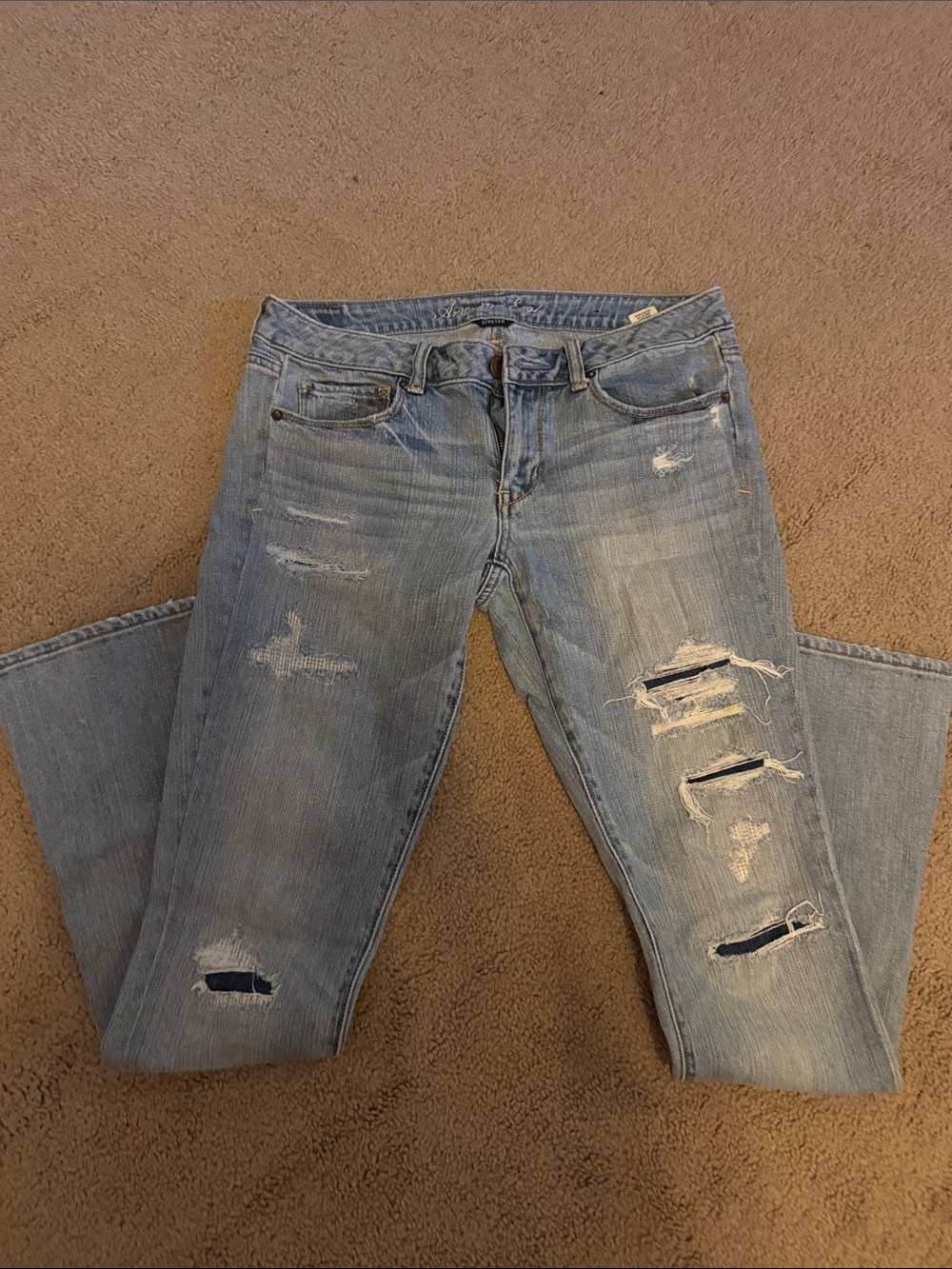 American Eagle Outfitters Light Blue Ripped Skinny Kick Jeans